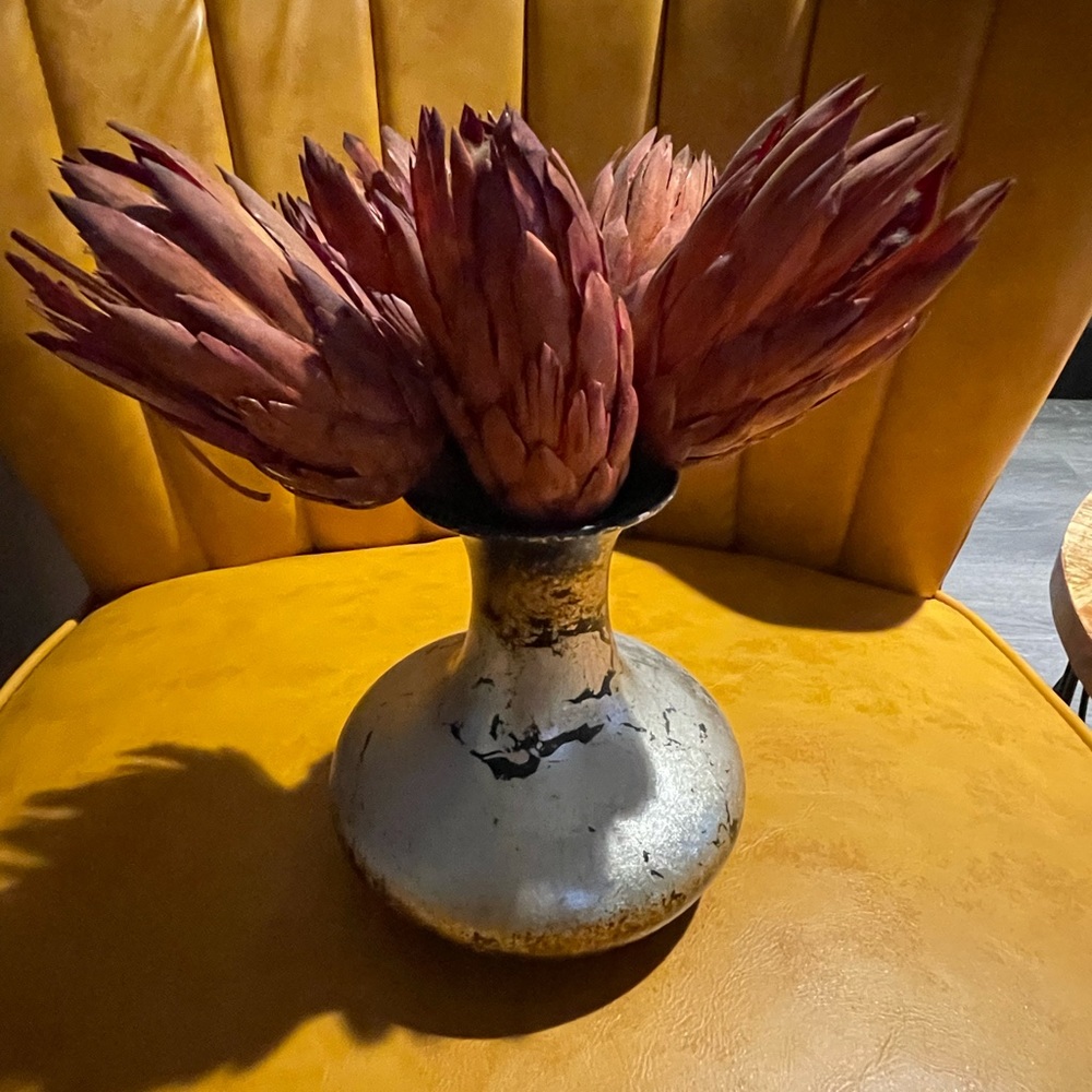 Flower vase include flowers
